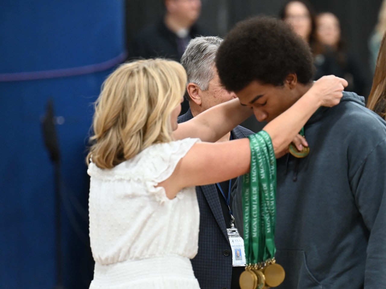 Student receiving medal